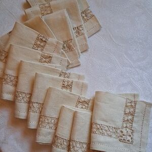 Set of twelve (12) elegant cream-colored lace trimmed linen cocktail napkins